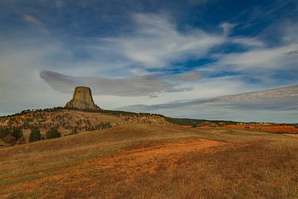 devils tower travel is sweet from a distance