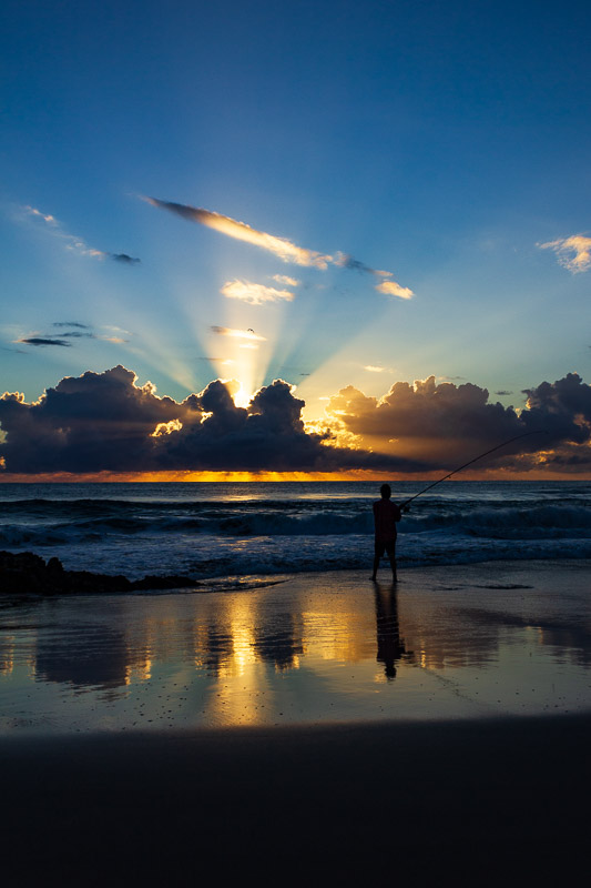 currumbin rock fisherman sunrise travel is sweet