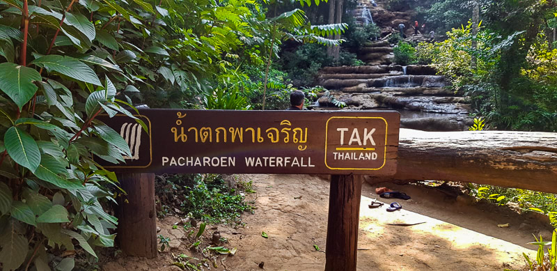 pha charoen waterfall sign travel is sweet